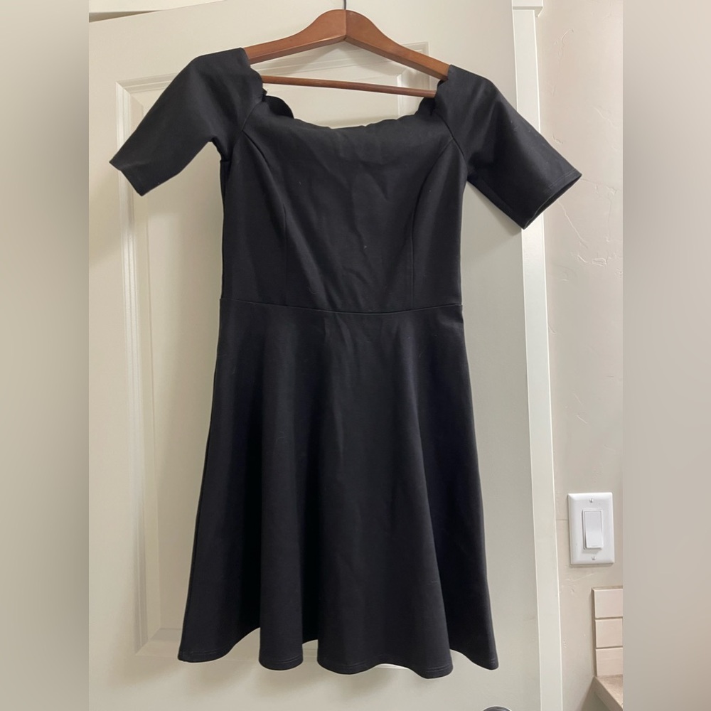 Short Black Dress with scalloped neck line- size small. New with tags